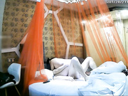 酒店偷拍刚下班的长裙美女和同事偷情,刚干完第2次男的好像接到老婆电话赶紧操